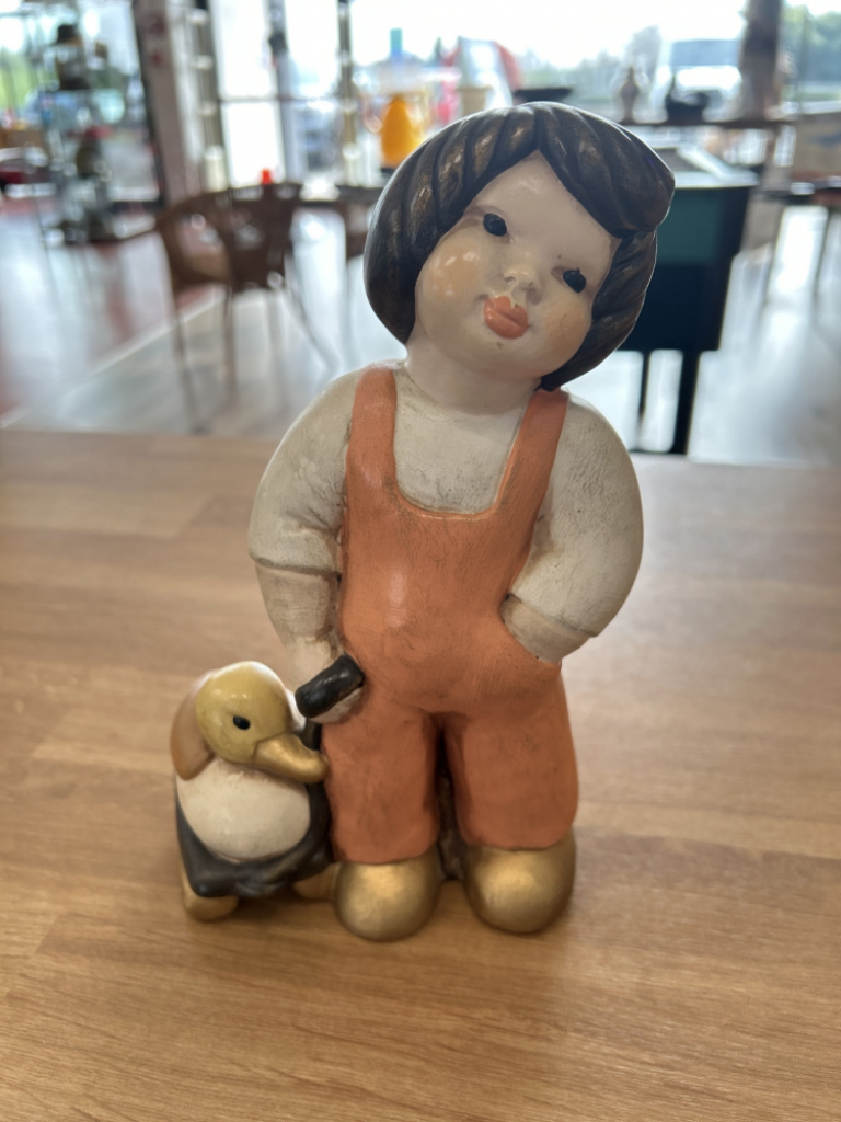 Mercatopoli Thun Bambina Con Papera Giocattolo Arancione